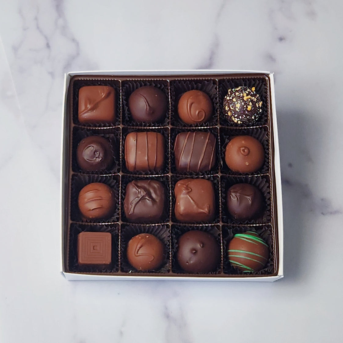 A 16 piece assortment of our most popular milk and dark chocolate creams, caramels, melt-aways and truffles.