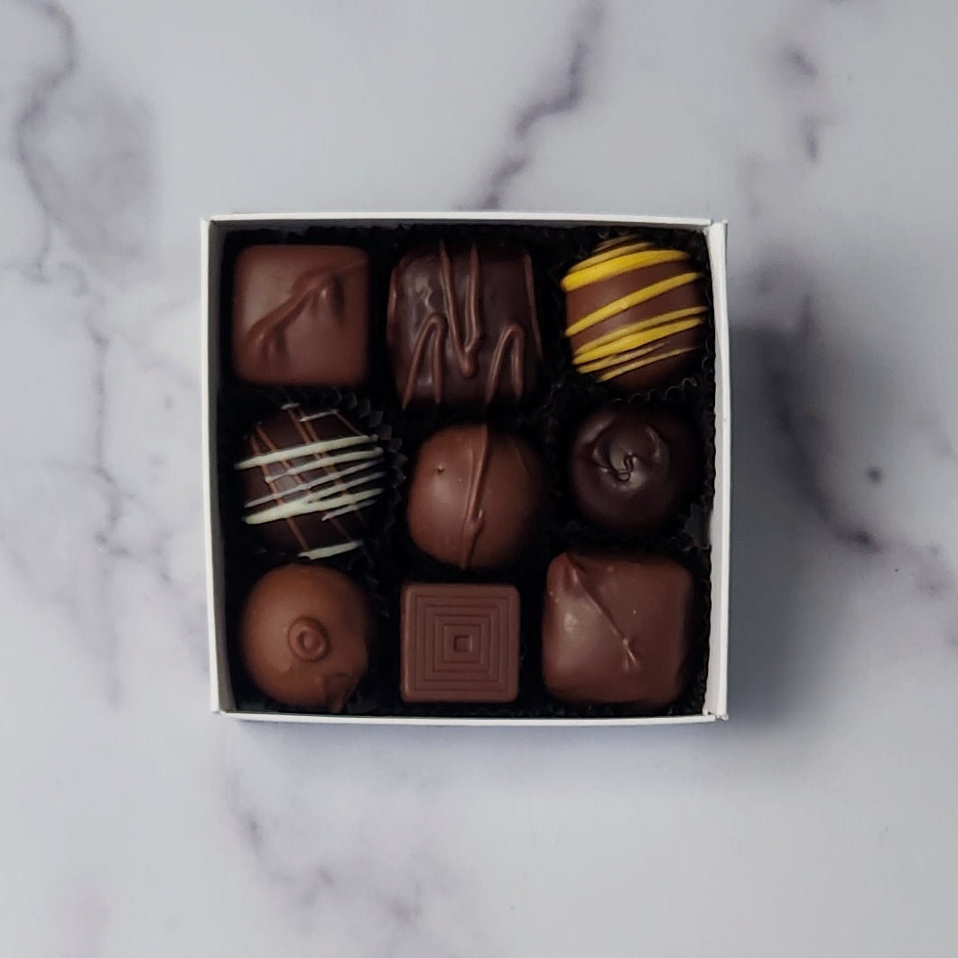 A 9 piece assortment of our most popular milk and dark chocolate creams, caramels, melt-aways and truffles.