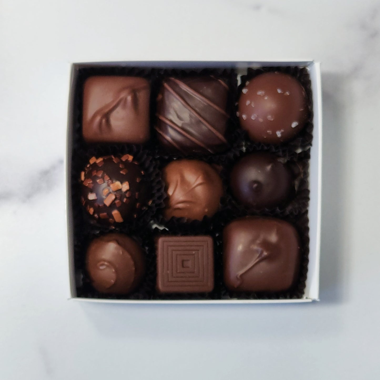 9 piece popular assortment in milk and dark chocolate
