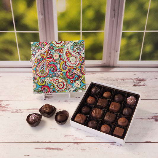 16 Piece milk and dark chocolate popular assortment. Packed in a beautiful paisley box and ready for gifting.