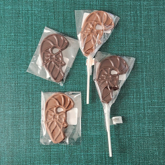 Chocolate candy cane lollipops and favors. Available in milk or dark chocolate.
