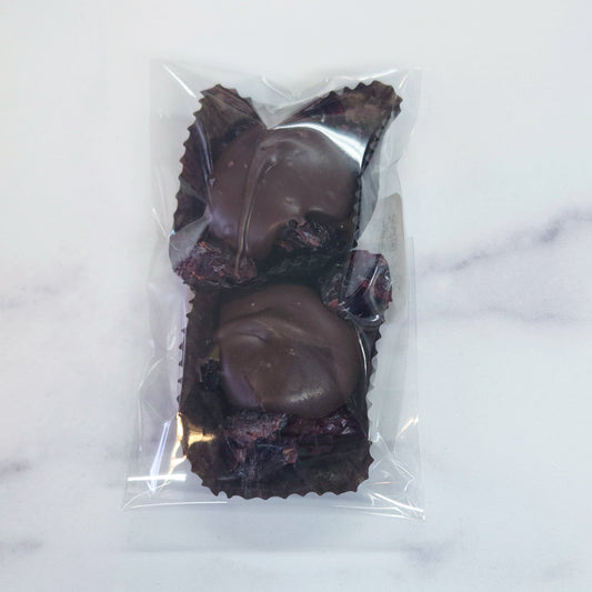 2 count package of dark chocolate cranberry caramel clusters