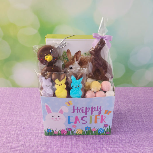 Easter Basket
This basket is filled with everything needed for a perfect holiday celebration, including a 3D Milk Chocolate Bunny, a 2-pack of Easter-decorated, milk chocolate-dipped Oreos, and Chocolate-Dipped Peeps for a fun twist on a classic treat. You'll also enjoy Milk Chocolate Malt Eggs and a 16-piece Milk & Dark Chocolate Popular Assortment with a festive Easter cover
