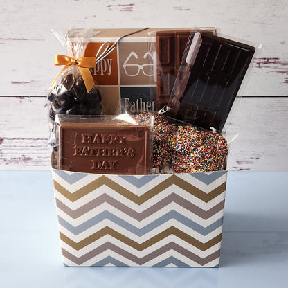 Milk and Dark Chocolate Candy bars, nonpareils, Chocolate covered cranberries and a chocolate assortment fill this basket making it the perfect gift for dad!