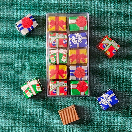 Spread holiday cheer with our Milk Chocolate Foiled Presents! Each piece is made from smooth, creamy milk chocolate and wrapped in vibrant, festive holiday foil, making them as delightful to look at as they are to eat. Packaged with 10 pieces per box, these little gifts are perfect for stocking stuffers, party favors, or adding a sweet touch to holiday tables.