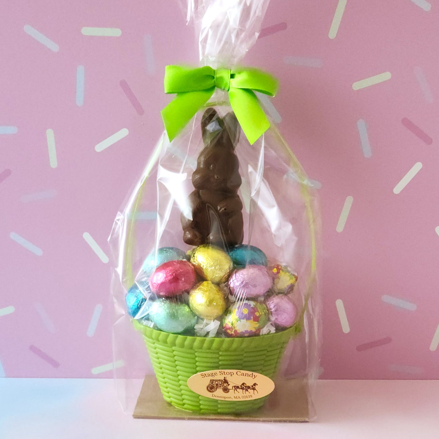 Basket With Foiled Chocolate Eggs And Pop