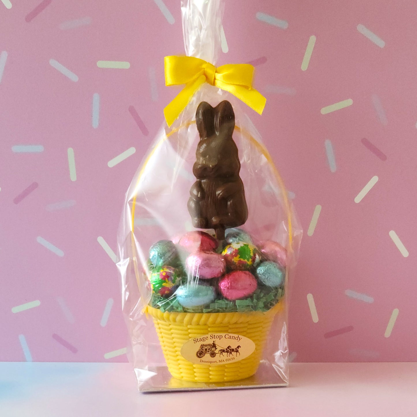 Basket With Foiled Chocolate Eggs And Pop