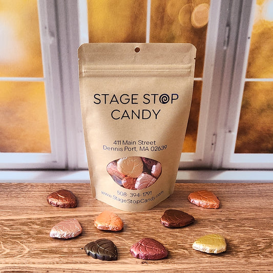 Leaf-shaped dark chocolate treats wrapped in vibrant, autumn-inspired foil. Available in a 16-piece box or a 5-ounce resealable bag with 18-19 pieces.