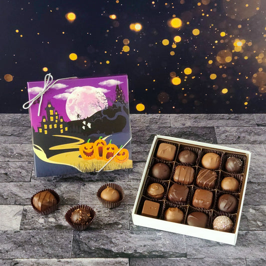This Halloween Night Assortment is available in 9-piece or 16-piece boxes, featuring a mix of milk and dark chocolate truffles, creams, caramels, and meltaways.