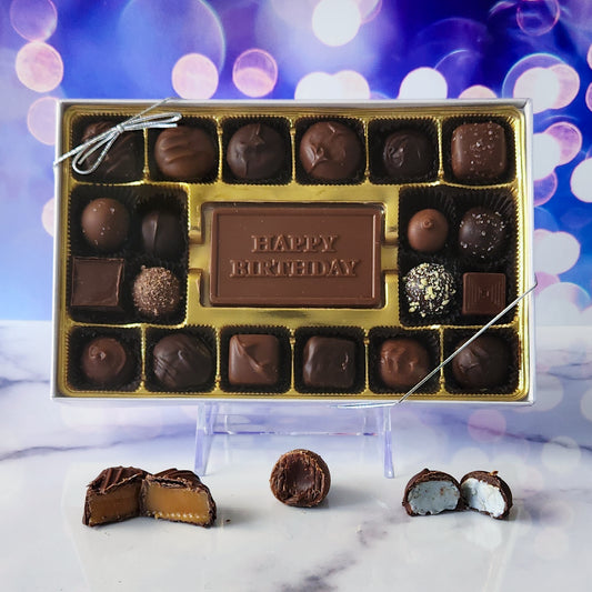 Make their birthday extra special with our 20-piece Happy Birthday Candy Box! Inside, a beautifully crafted milk chocolate card that says "Happy Birthday" is surrounded by an assortment of creamy milk and dark chocolate soft center creams, decadent truffles, and luscious caramels. It's the perfect way to celebrate their special day with a generous and delicious treat!
