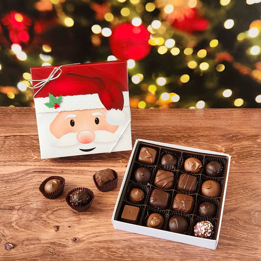 16 piece chocolate assortment in decorative Santa Clause box. Filled with a variety of creams, caramels, melt-aways and truffles.