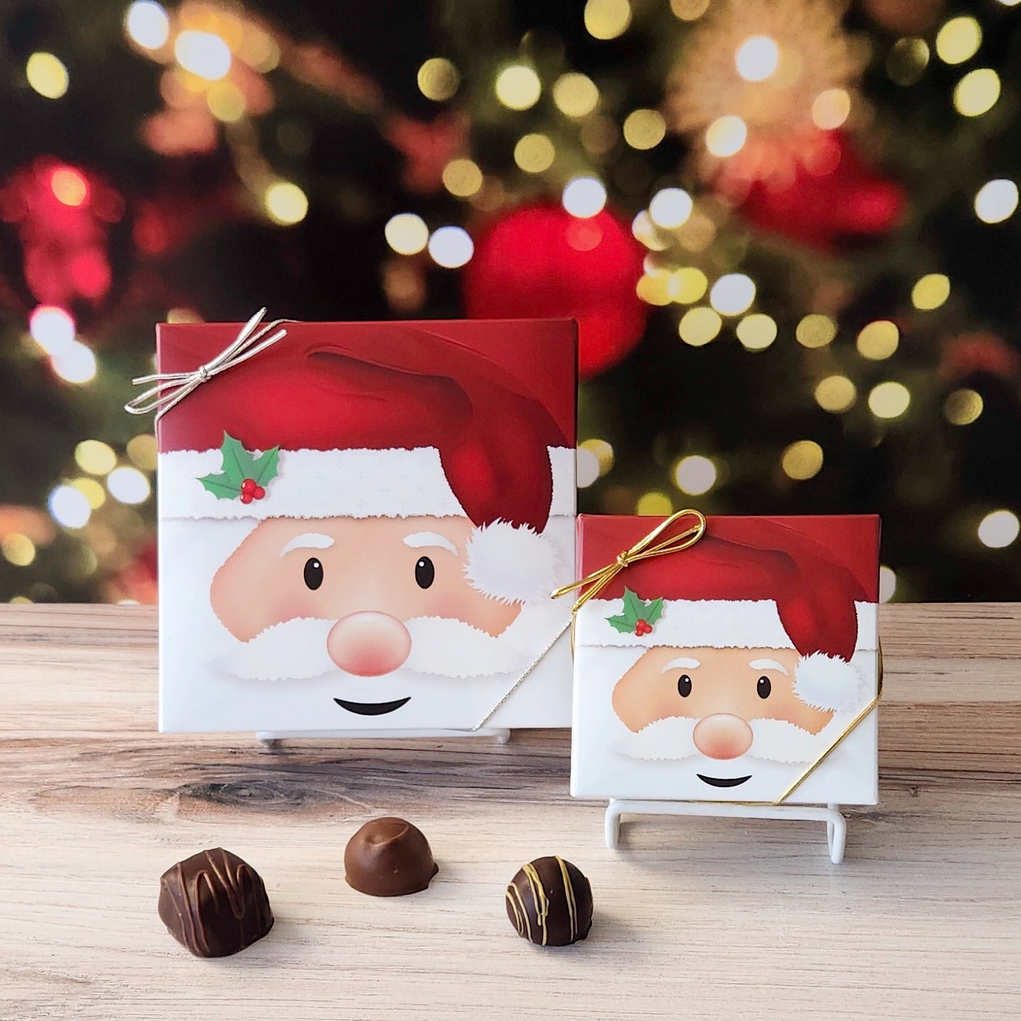 An assortment of our most popular milk and dark chocolate creams, caramels, melt-aways, and truffles all packed inside a box with a jolly Santa face printed on the cover.