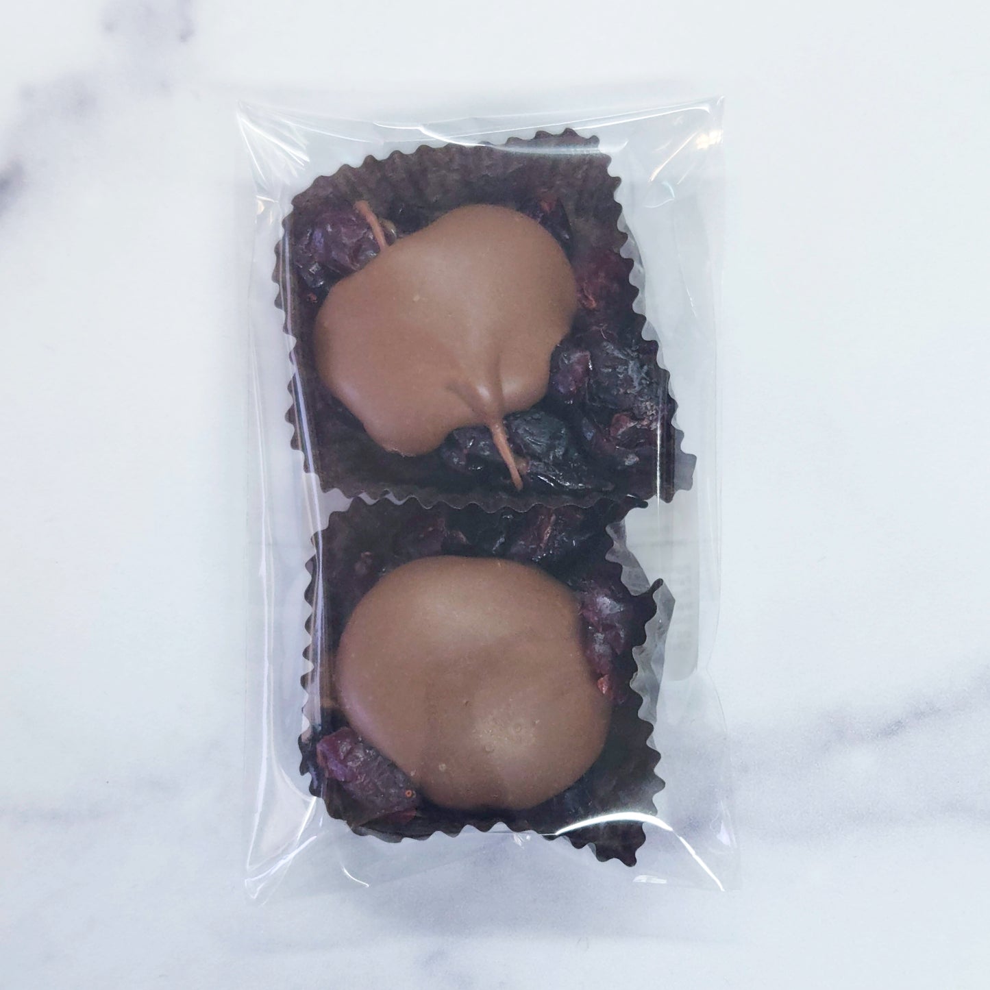 2 count package of milk chocolate cranberry caramel clusters