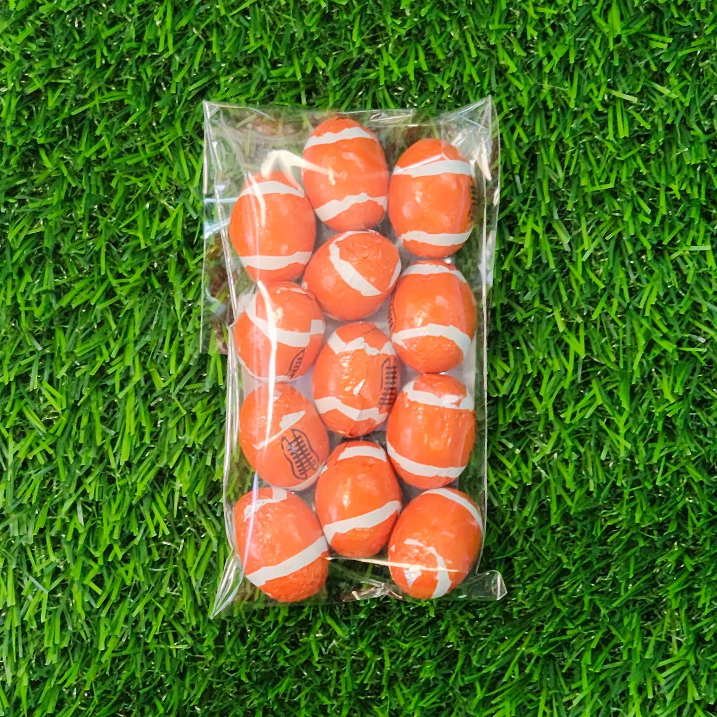 Milk Chocolate foiled footballs.
12 count bag.
