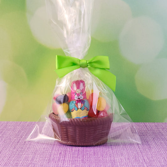 Edible milk chocolate basket filled with jelly beans and a foiled milk chocolate bunny