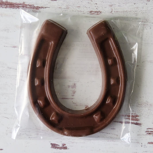 A milk chocolate horseshoe makes a great party favor for any farm themed party or horse enthusiast.