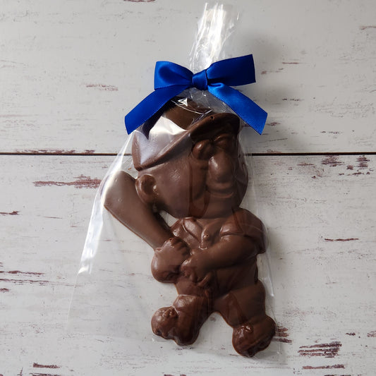 The perfect gift for any baseball fan! Creamy Milk Chocolate favor in the shape of a baseball player at bat. 