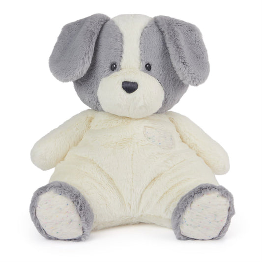 A snuggly plush puppy dog made by gund. This stuffed animal is all ready for a hug.