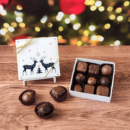9 Piece Winter Reindeer Chocolate Assortment filled with a variety of creams, caramels, melt-aways and truffles.