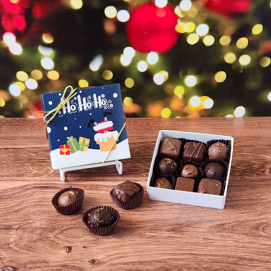 9 Piece Santa in Chimney Chocolate Assortment filled with a variety of creams, caramels, melt-aways and truffles.