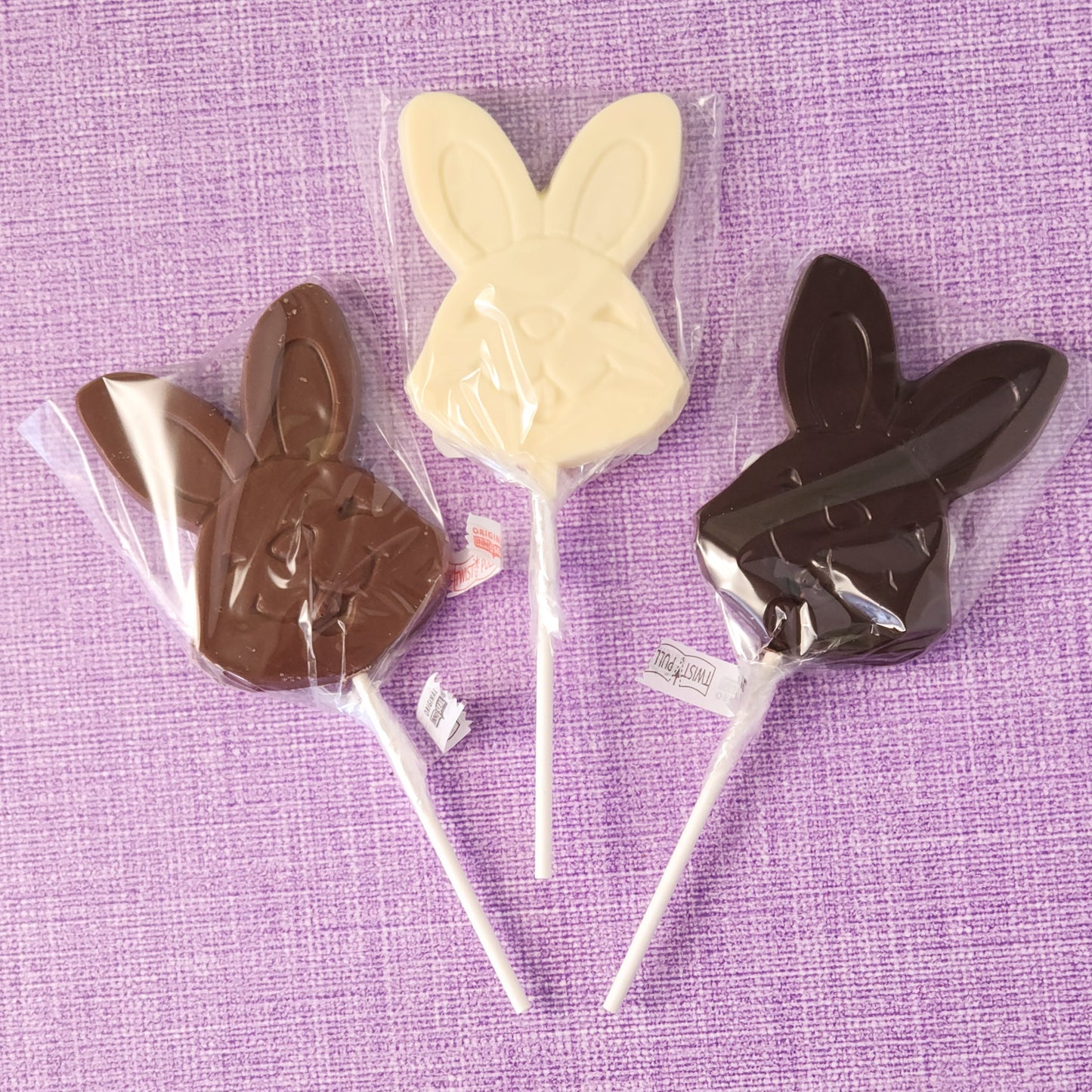 Smiling bunny lollipop - available in milk, white or dark chocolate