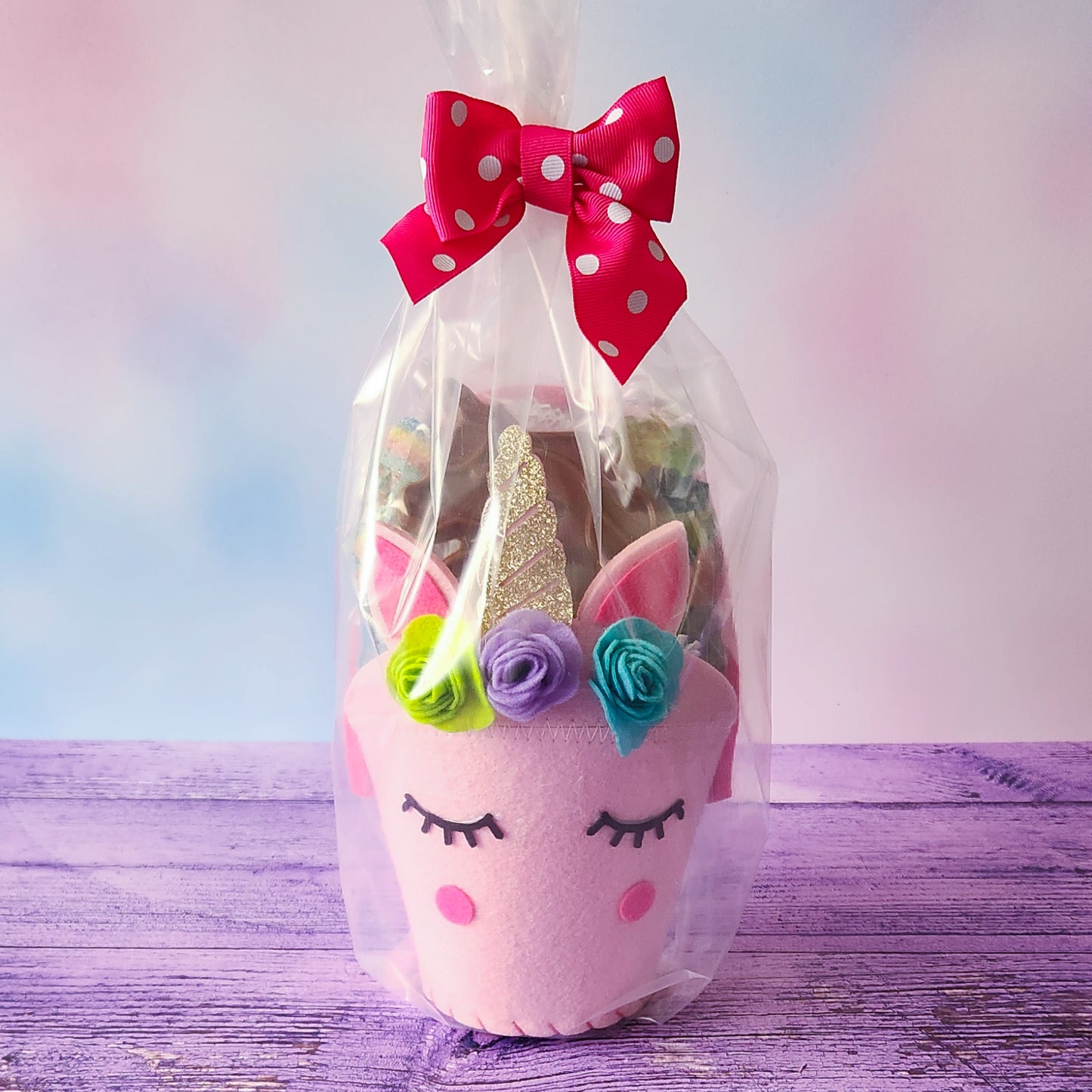 Overwrapped and tied with a bow this girly basket is ready to gift.