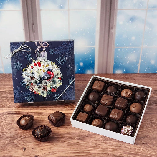16 Piece Winter Bird Chocolate Assortment. Inside, you'll find a handpicked selection of our most popular milk and dark chocolates. Creamy soft centers, buttery caramels, dreamy melt-aways, and decadent truffles.