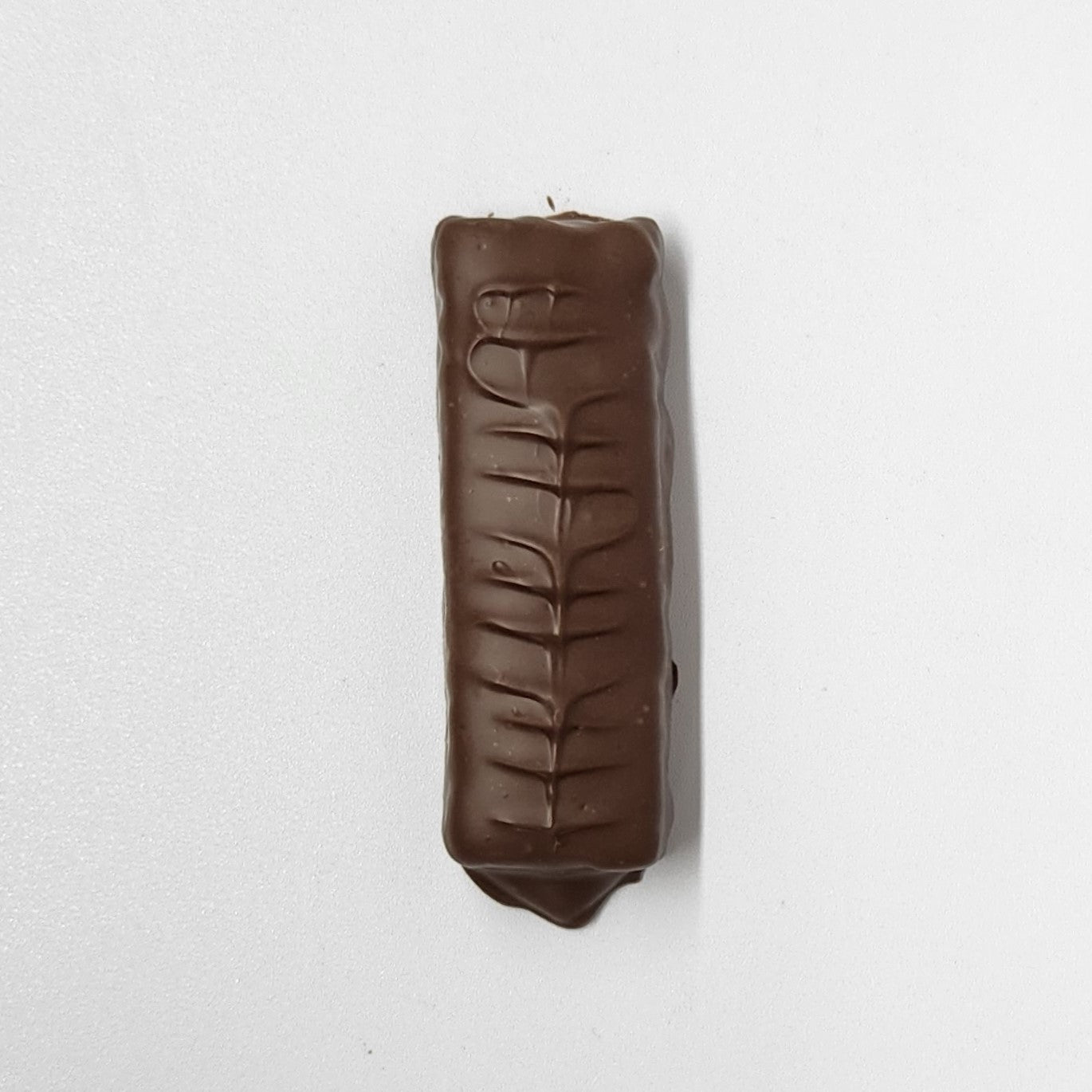 Handcrafted milk chocolate cinnamon crunch bar