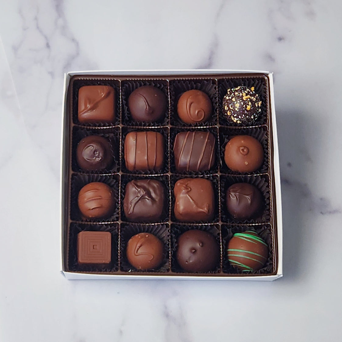 A 16 piece assortment of our most popular milk and dark chocolate creams, caramels, melt-aways and truffles. 