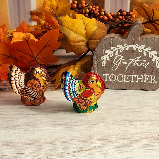 Highly detailed semi-solid chocolate wrapped in vibrant Italian foil. The perfect Thanksgiving table decoration and place card holder, each weighing 1 oz. 