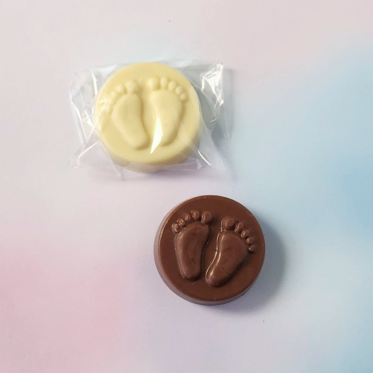 Chocolate circles with footprints on them.