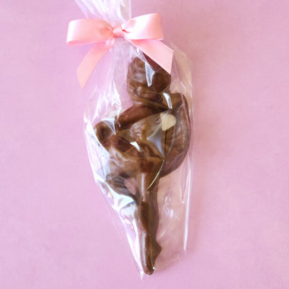 The perfect recital gift for the dancer in your life. This Milk Chocolate ballerina is overwrapped and tied with a pink bow. 