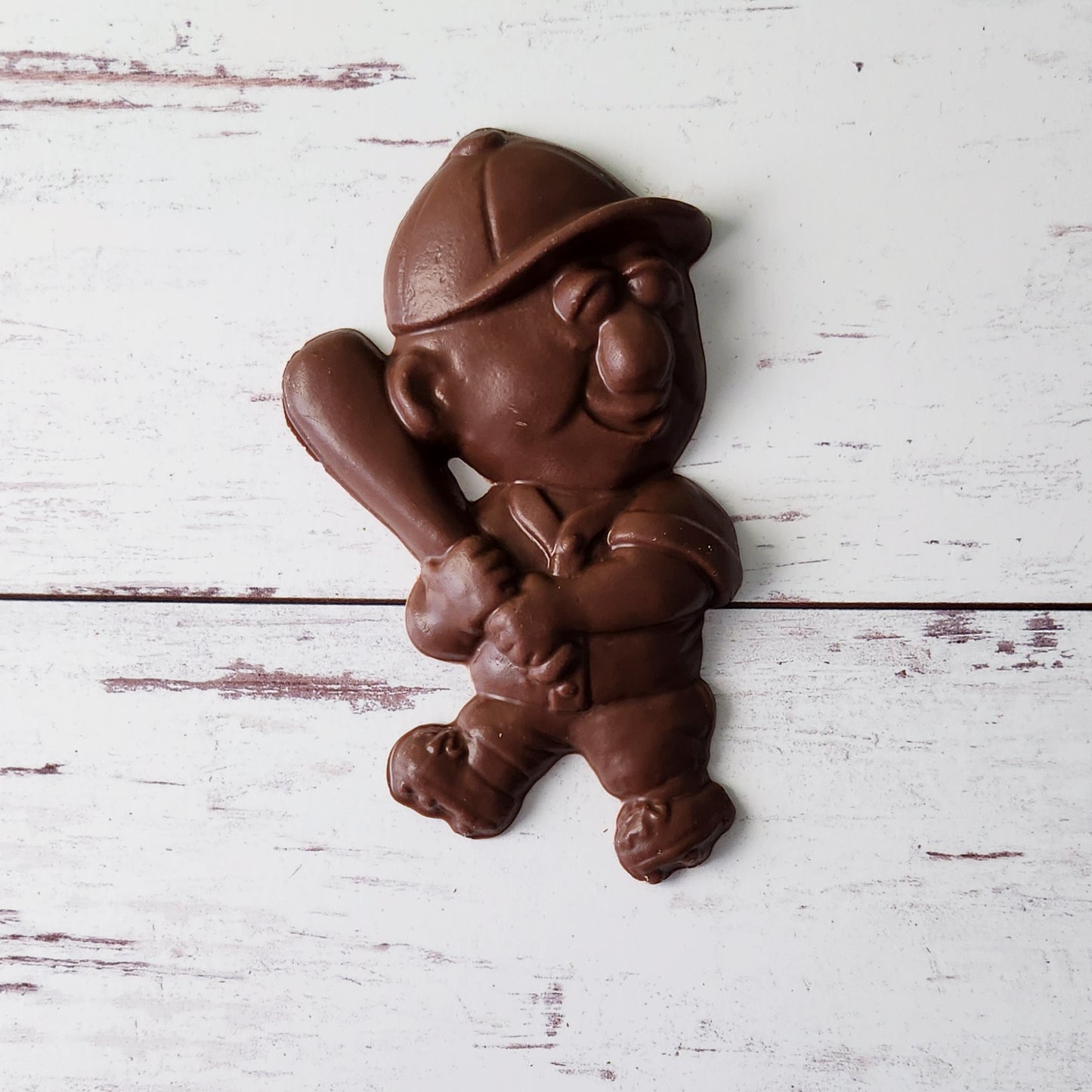 Get ready to play ball with our chocolate baseball player. Ready to hit a homerun this chocolate favor will be the grand slam at any game.