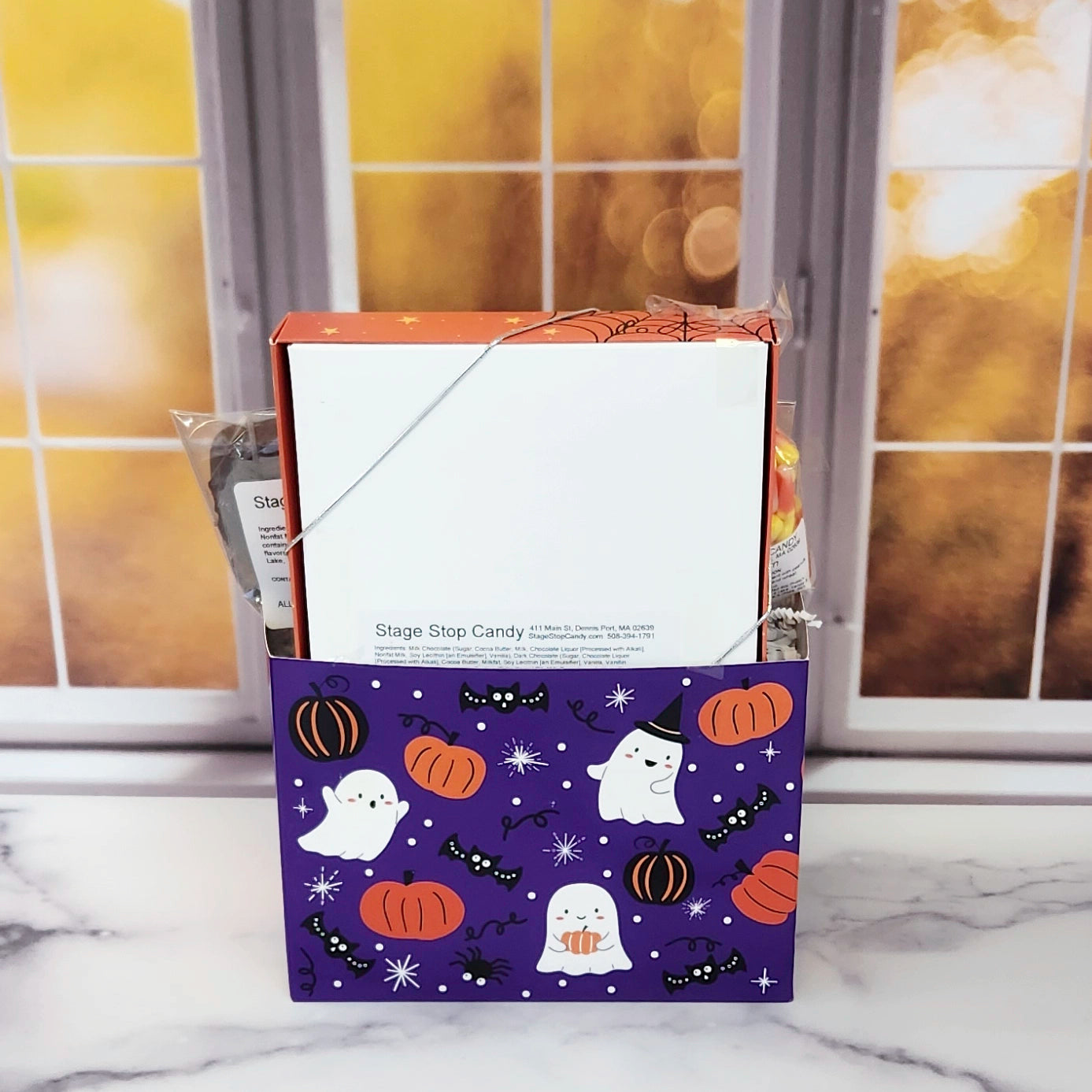 Halloween Boo Gift Basket.
Inside this fun Halloween themed basket you will find Candy Corn, a Milk Chocolate Witch, Halloween Chocolate-Covered Oreos, Chocolate-Covered Peeps, and a 16-Piece Happy Halloween Chocolate Assortment (creams, caramels, melt-aways, truffles)