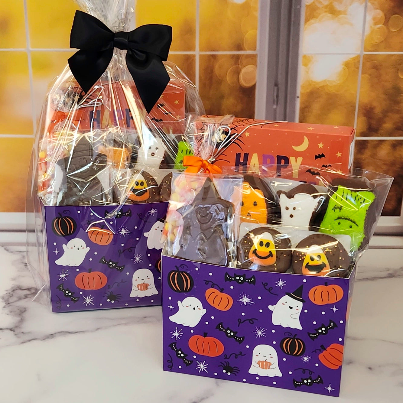 Halloween Boo Gift Basket.
Inside this fun Halloween themed basket you will find Candy Corn, a Milk Chocolate Witch, Halloween Chocolate-Covered Oreos, Chocolate-Covered Peeps, and a 16-Piece Happy Halloween Chocolate Assortment (creams, caramels, melt-aways, truffles)