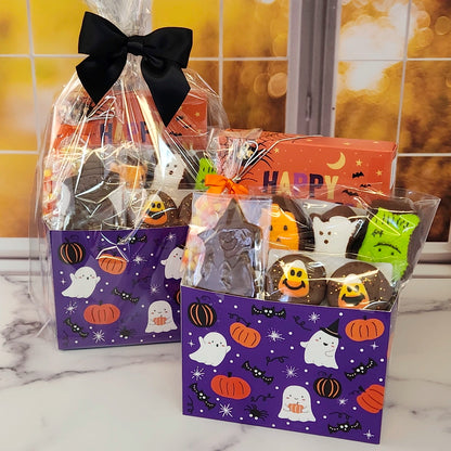 Halloween Boo Gift Basket.
Inside this fun Halloween themed basket you will find Candy Corn, a Milk Chocolate Witch, Halloween Chocolate-Covered Oreos, Chocolate-Covered Peeps, and a 16-Piece Happy Halloween Chocolate Assortment (creams, caramels, melt-aways, truffles)