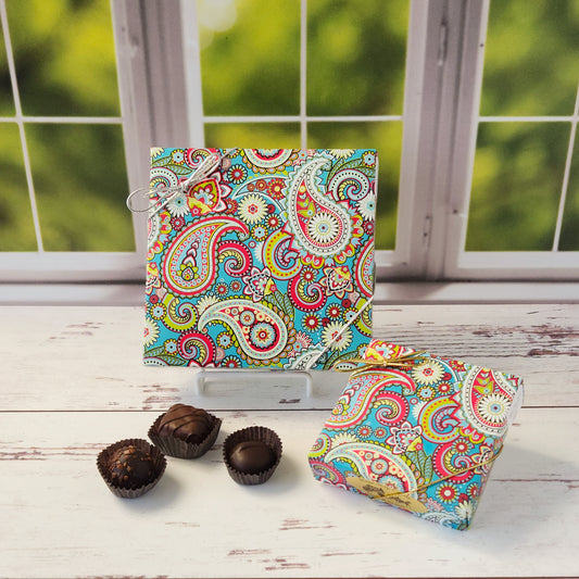 16 Piece milk and dark chocolate popular assortment.  Packed in a beautiful paisley box and ready for gifting.