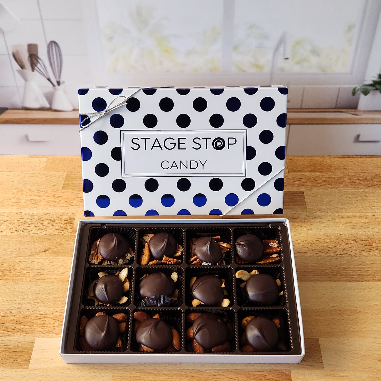 Made with freshly roasted nuts (almonds, cashews, or pecans), held together with our vanilla caramel and topped with our rich Dark chocolate. Each assortment typically contains all 3 nuts but substitutions may be made due to inventory limitations.
12 piece box