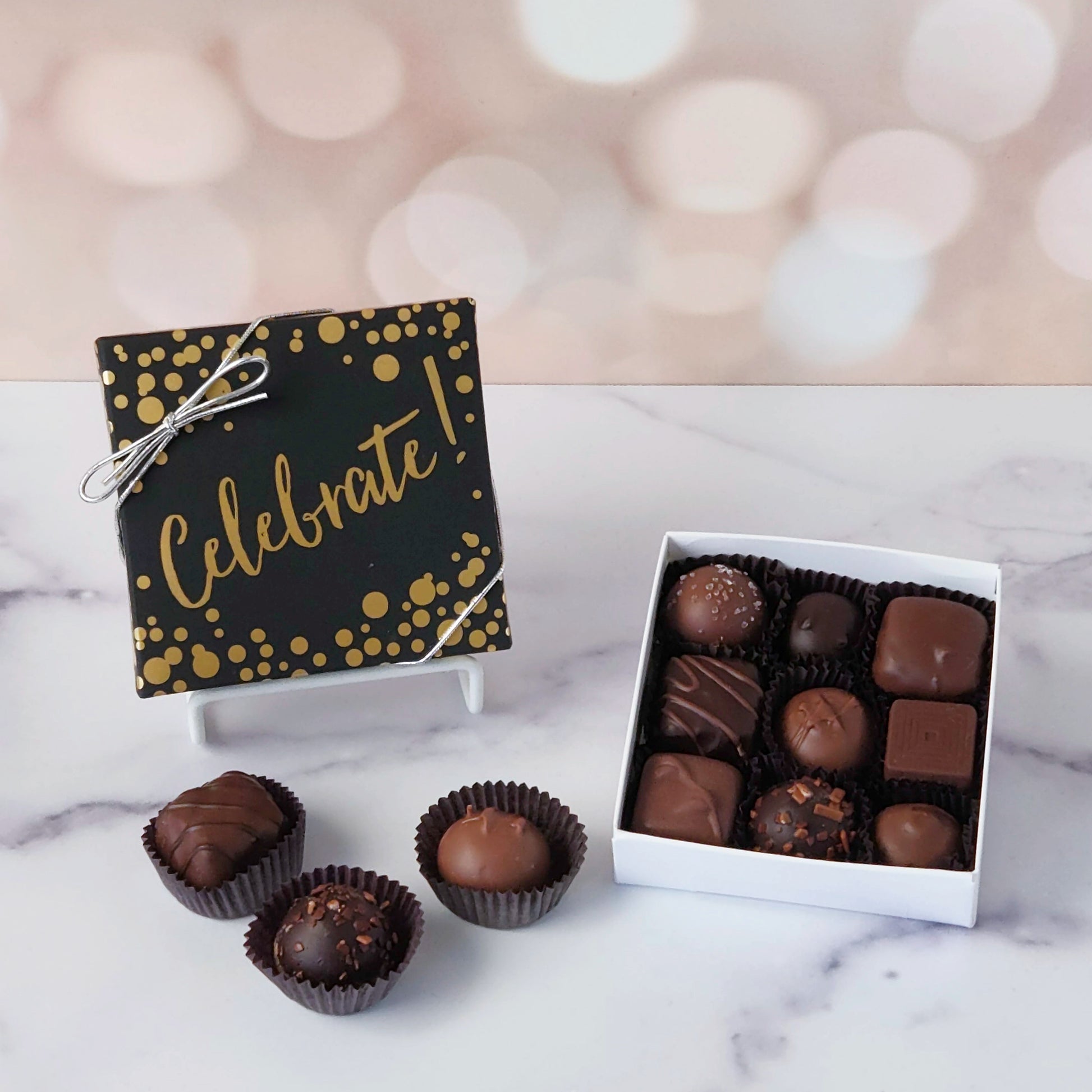 Delight someone special with our Celebrate assortment box - a thoughtfully curated mix of creams, caramels, melt‑aways, and truffles in milk and dark chocolate.
9 Piece box