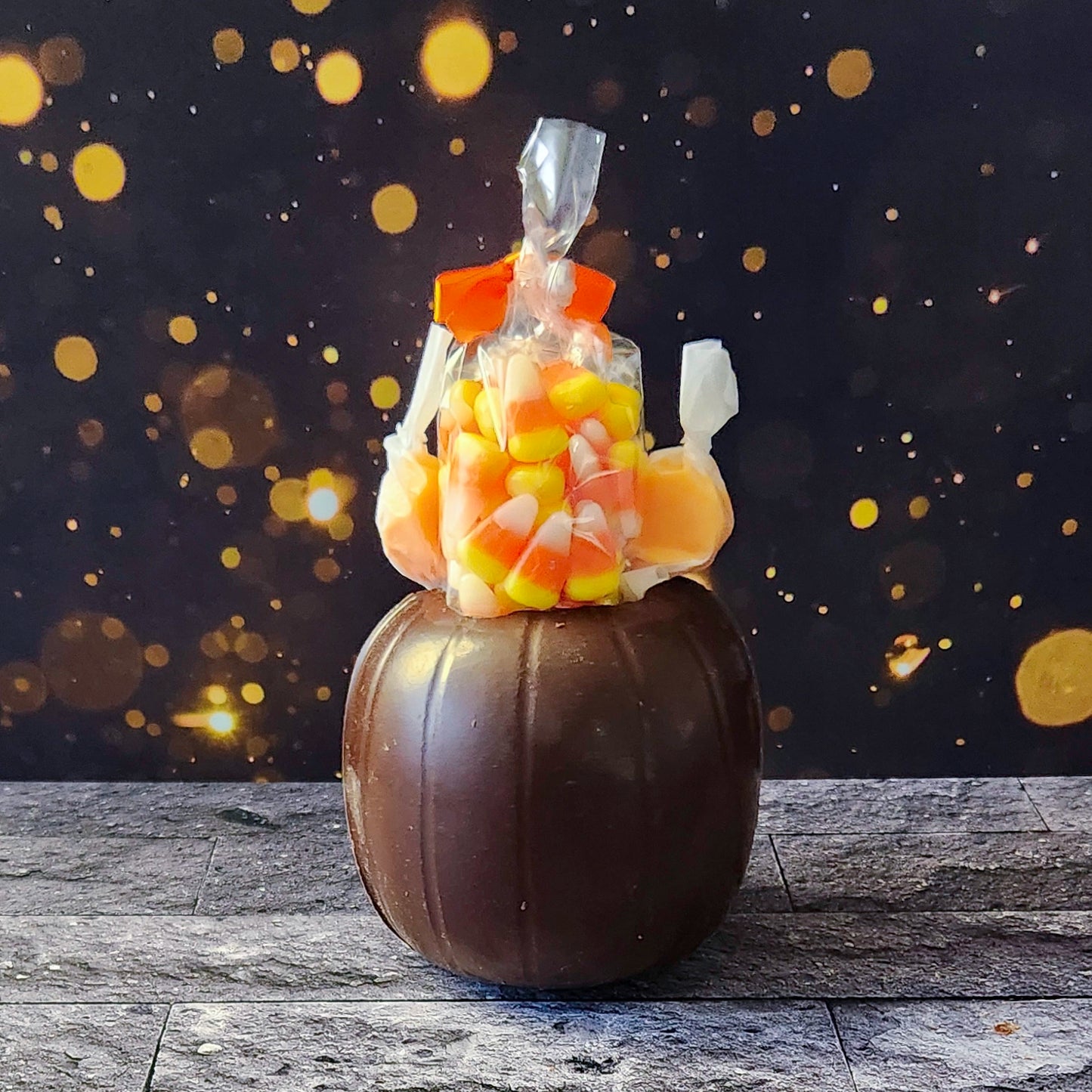 Get ready for fall fun with our Chocolate 3D Pumpkin, crafted from our delicious dark chocolate and filled with a festive assortment of treats! Inside this hollow pumpkin, you’ll discover Orange Taffy, Candy Corn, and a Ghost Peep.  Perfect for celebrating the season with a combination of sweet surprises.
Due to its delicate nature, this item is only available for in-store pick-up.