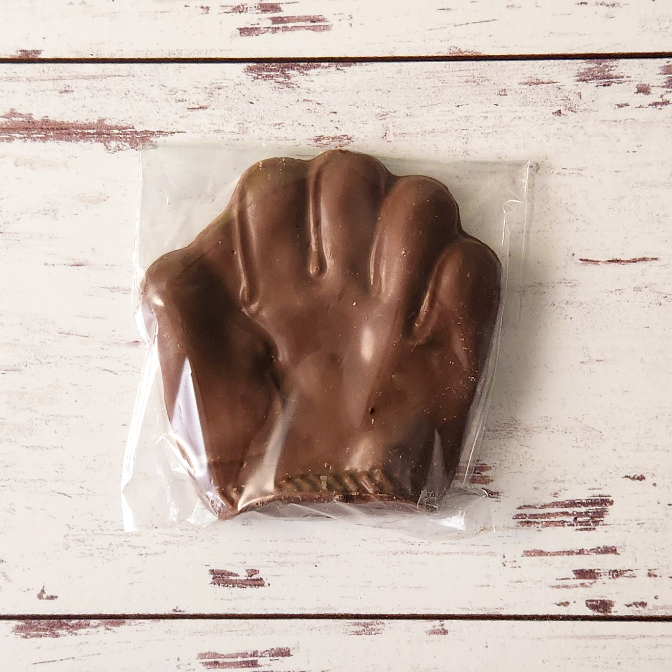 Win the snack game with our chocolate baseball glove. 