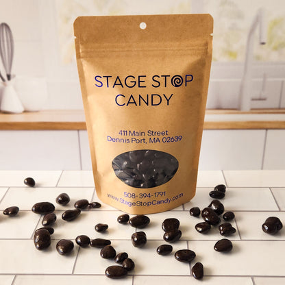 Savor the sweet and tart flavors of our 6-ounce bag of Dark Chocolate Covered Cranberries, perfect for a tasty snack or party treat. Enjoy the rich dark chocolate coating paired with tangy cranberries in every bite.