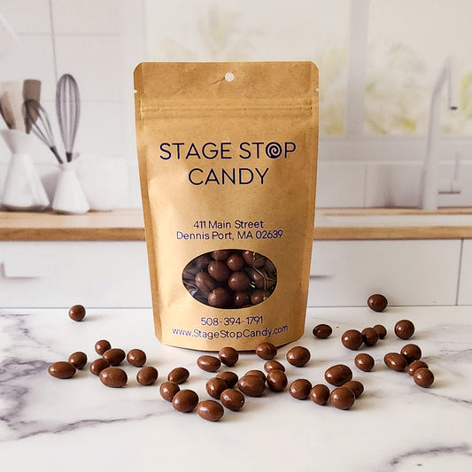 Enjoy the perfect blend of crunchy peanuts and creamy milk chocolate with our Milk Chocolate Covered Peanuts. Available in a convenient 6-ounce bag, perfect for snacking or sharing.