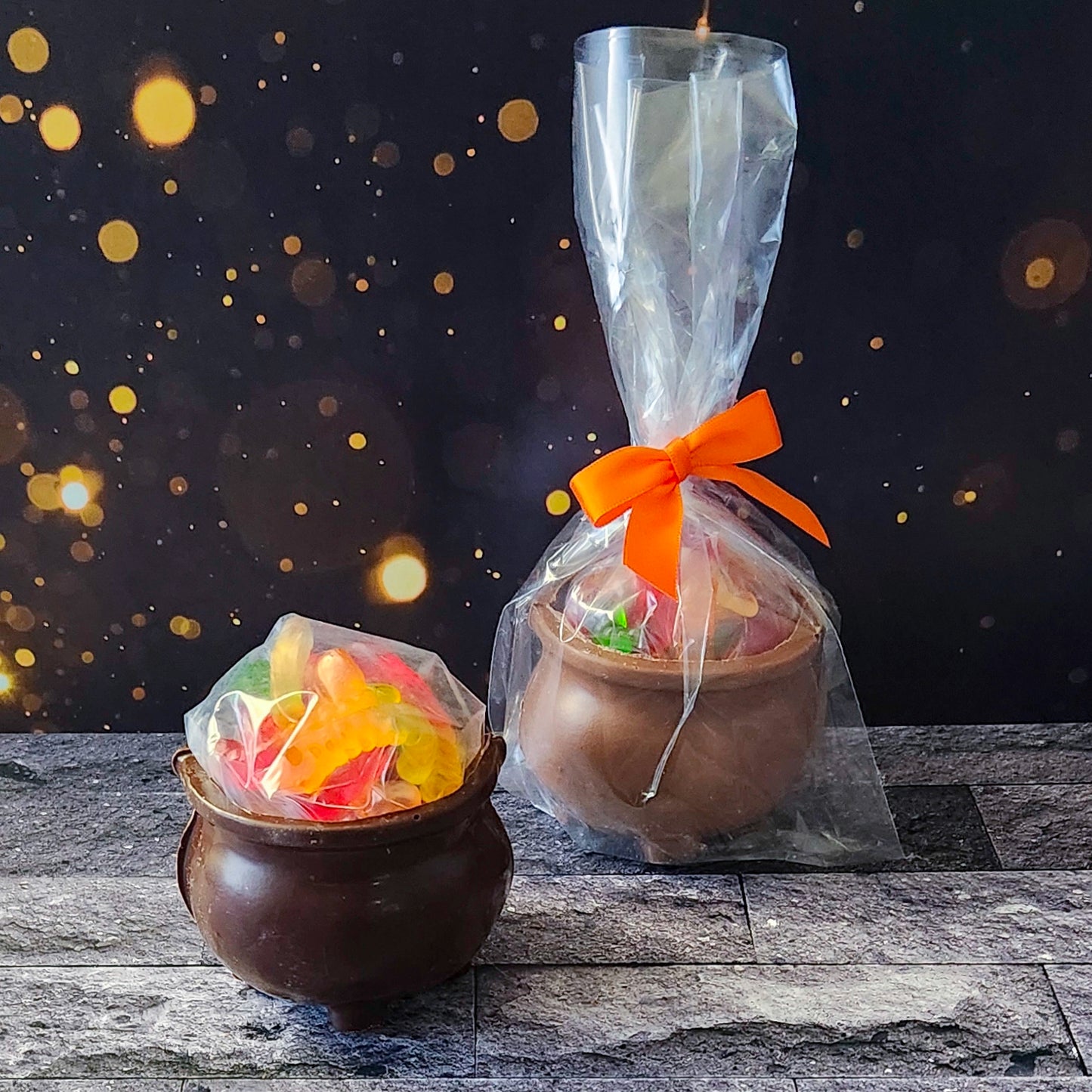 Cast a sweet spell this Halloween with our Chocolate 3D Kettle, crafted from our rich and creamy chocolate. Inside this fun, witchy cauldron, you’ll find a mix of Salt Water Taffy and Gummy Worms. 
Due to its fragile nature, this spooky treat is only available for in-store pick-up.