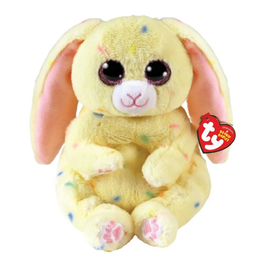 Cream is a stuffed beanie baby from TY with a yellow cream color and rainbow sprinkles.