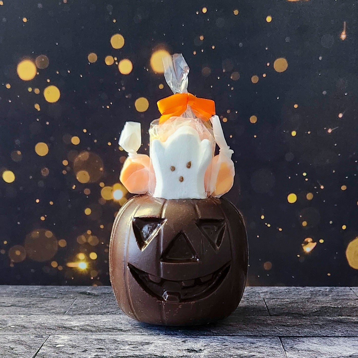 Get ready for fall fun with our Chocolate 3D Pumpkin, crafted from our delicious dark chocolate and filled with a festive assortment of treats! Inside this hollow pumpkin, you’ll discover Orange Taffy, Candy Corn, and a Ghost Peep.  Perfect for celebrating the season with a combination of sweet surprises. Due to its delicate nature, this item is only available for in-store pick-up.