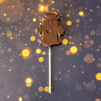 Dark Chocolate Ghost with hat Lollipop.  Measuring approximately 2.75 inches wide by 3.25 inches tall (excluding the pop stick) 