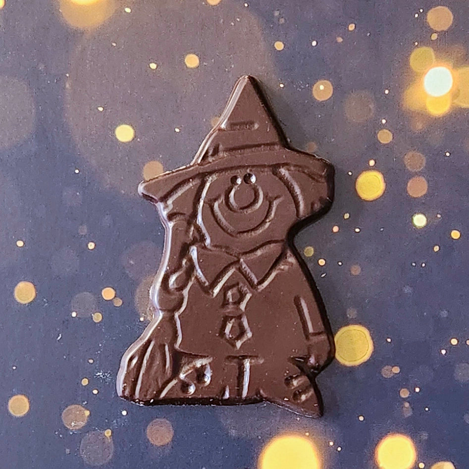 Cast a delicious spell this Halloween with our Enchanting Chocolate Witch! Made from the finest dark chocolate, this delightful witch is here to bring joy and sweetness to your celebrations. 