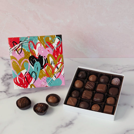 Indulge in a chocolate adventure with our Fluttering Heart Box! - a delightful assortment of creams, caramels, melt‑aways, and truffles in milk and dark chocolate.
16 Piece box