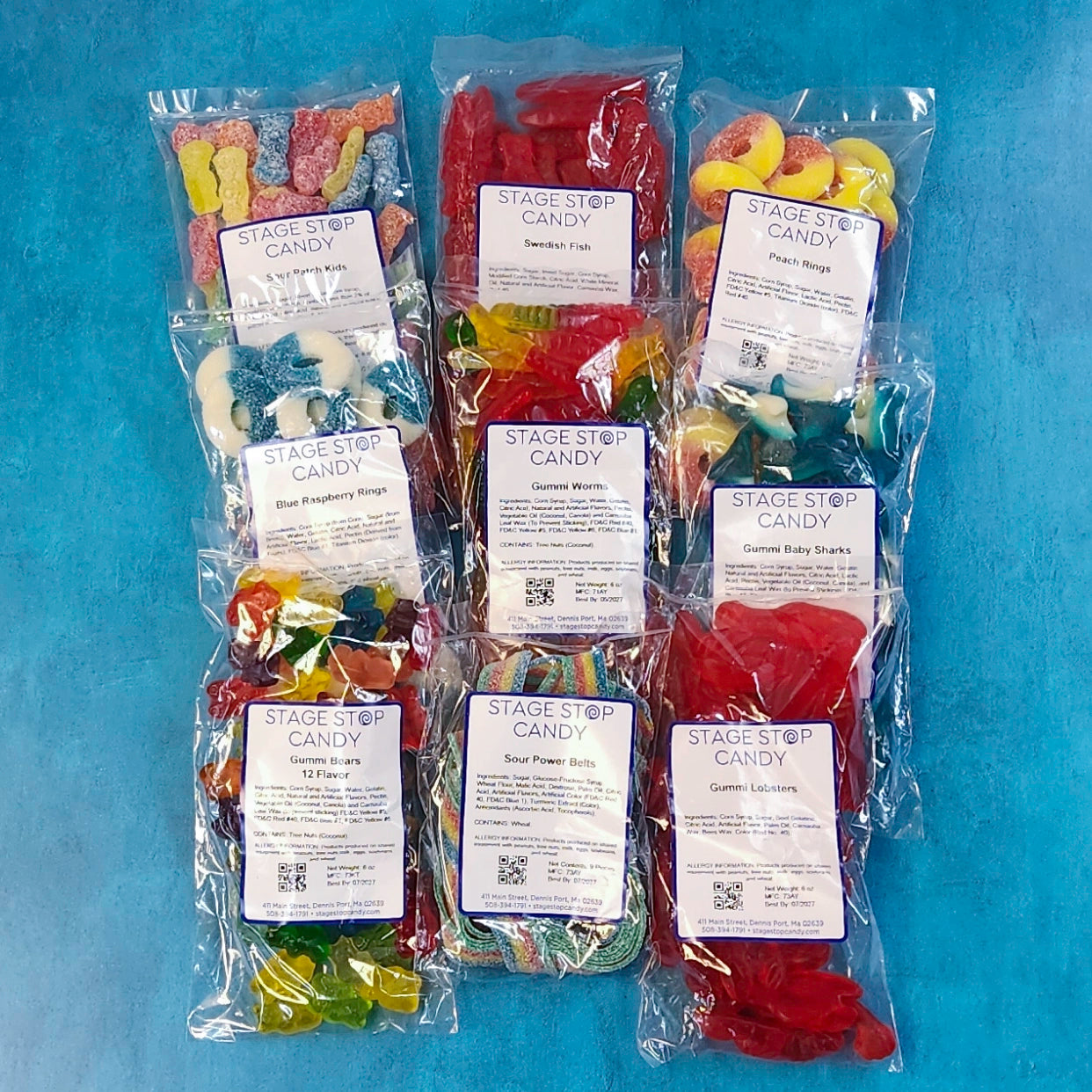 Get ready for the ultimate gummy candy experience with our Gummi Goodies Care Package.  Included in this bundle you will find Gummi Baby Sharks, Blue Raspberry Rings, 12-Flavor Gummi Bears, Gummi Lobsters, Gummi Worms, Peach Rings, Sour Patch Kids, Sour Power Belts, and Swedish Fish. 